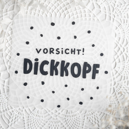 Bügelbild: Vorsicht Dickkopf (schwarz)